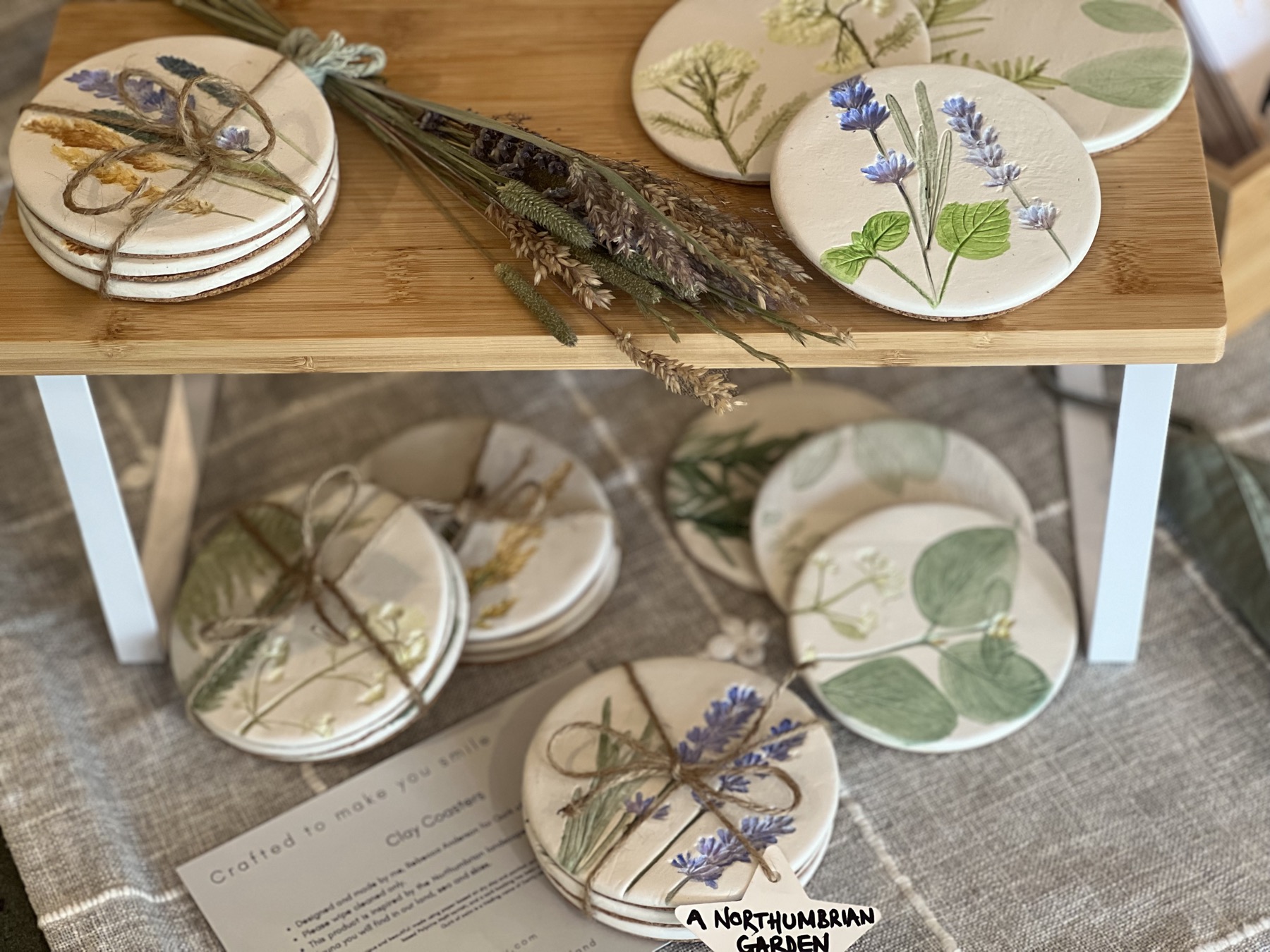 A Quirk of Calm market display of botanical decorations and gifts